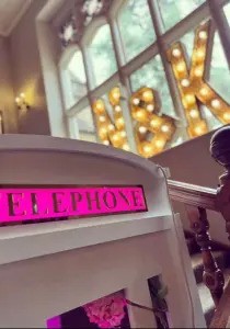 Vintage-style telephone booth used as event decor