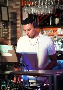 Instagram post featuring DJ performing live